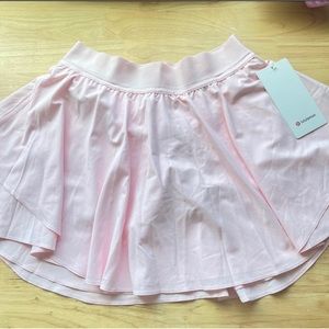 NWT lululemon court rival skirt HR size 8 *Long
Color: Strawberry Milkshake